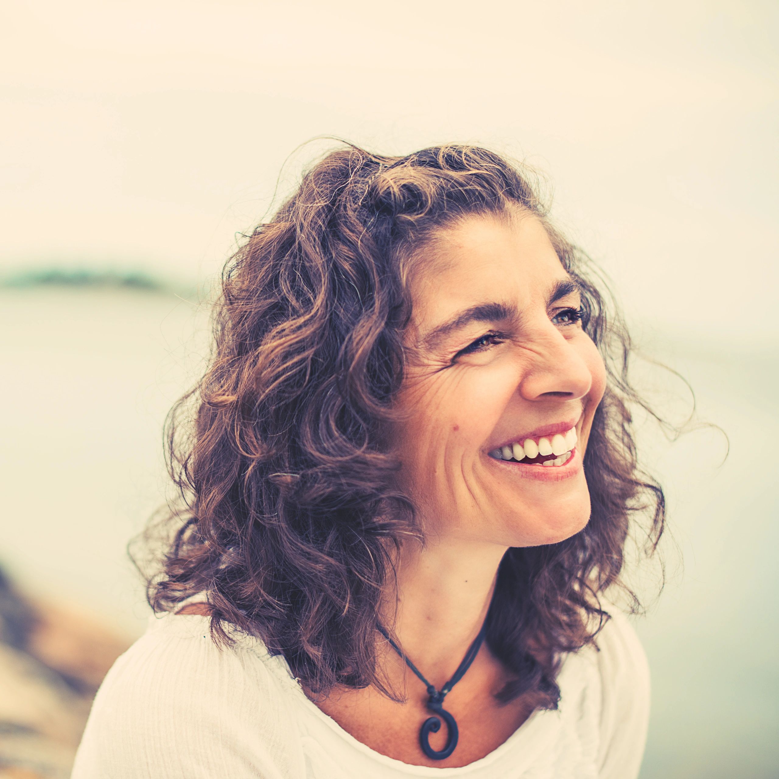 Smiling woman headshot outdoors